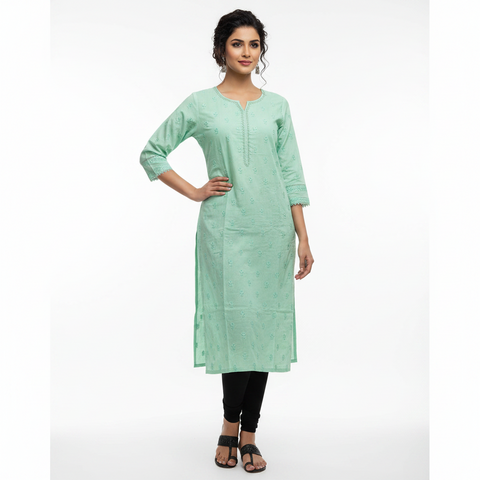 Green kurta hanging on a rack with colorful clothes in the background